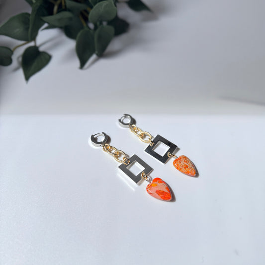 Heart of orange örhängen - Design by Brandeby
