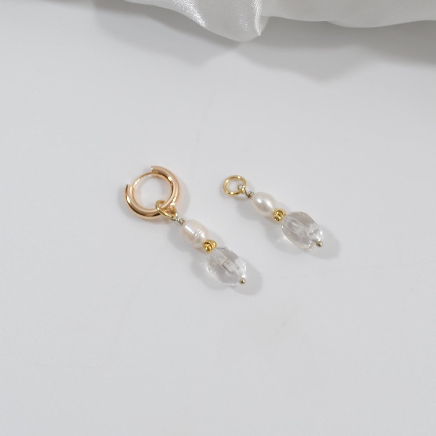 påhäng äkta bergkristall creoler ringar guld design by brandeby