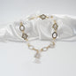 kort halsband i silver och guld med blommor bergkristall design by brandeby
