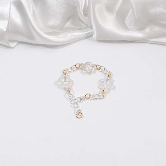 armband i guld och silver med blommor design by brandeby