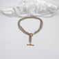 gold power halsband i kedjor och guld detaljer design by brandeby