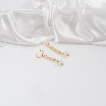 örhängen eleganta bergkristall guldkedja creoler ringar i guld design by brandeby