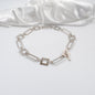 kort halsband i silver delar design by brandeby