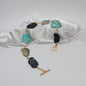 sky halsband i blå nyanser av imperial jasper ädelsten kort halsband designbybrandeby
