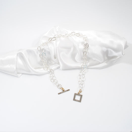 halsband med kedja och guldringar design by brandeby