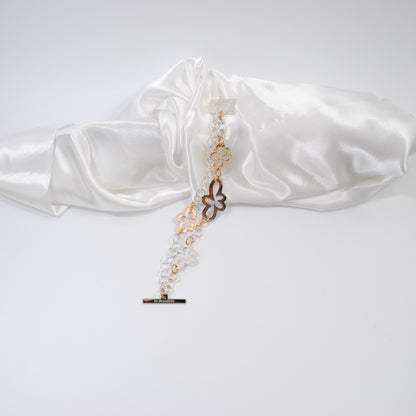 armband i lyx modell guld och silver blommor med kedja i två rader design by brandeby