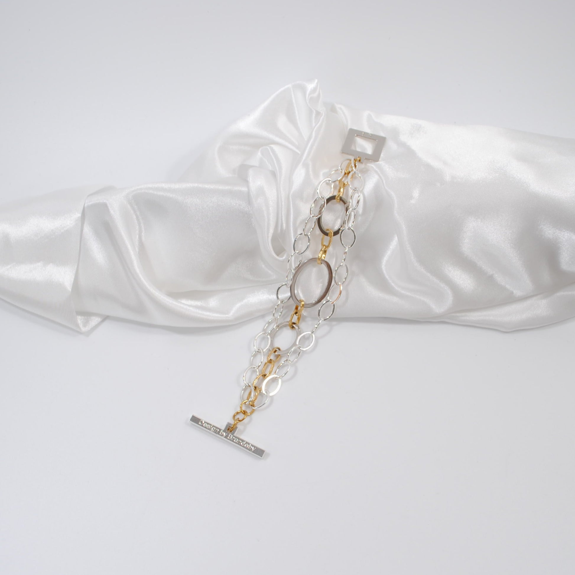 armband i tre rader guld och silver design by brandeby