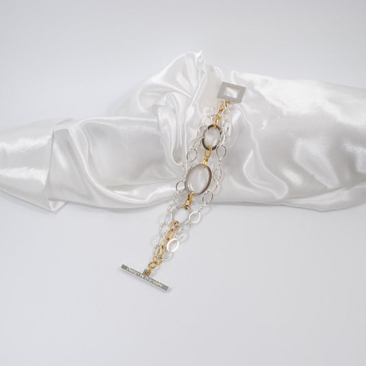 armband i tre rader guld och silver design by brandeby