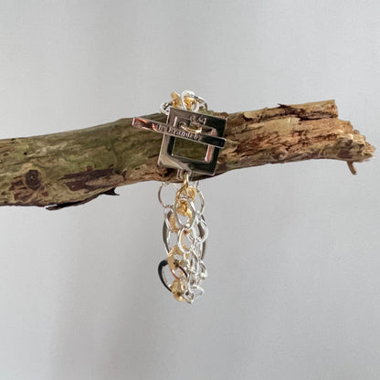 armband i tre rader med guld och silver detaljer äkta