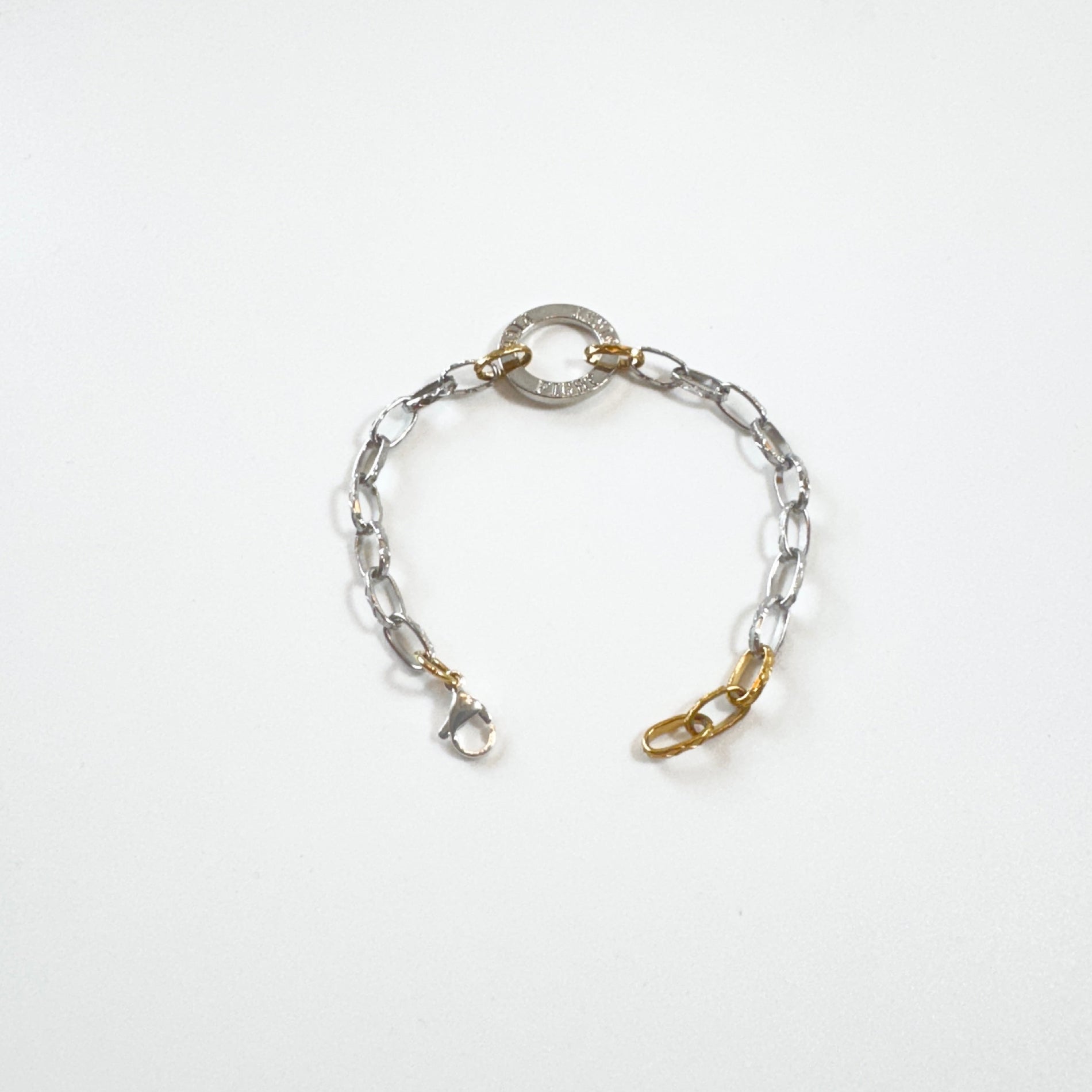 Link Fight – Handgjort armband i silver och guld | Design by Brandeby