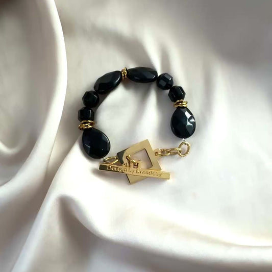 video på Elegance Shadow Armband - Svart Onyx Obsidian Guld Handgjort Sverige - design bybrandeby